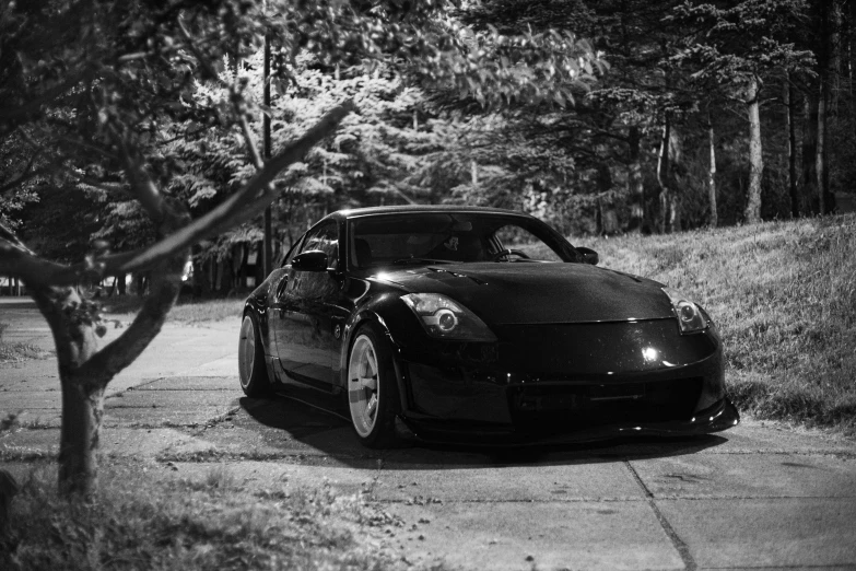 black and white po of a car on a road