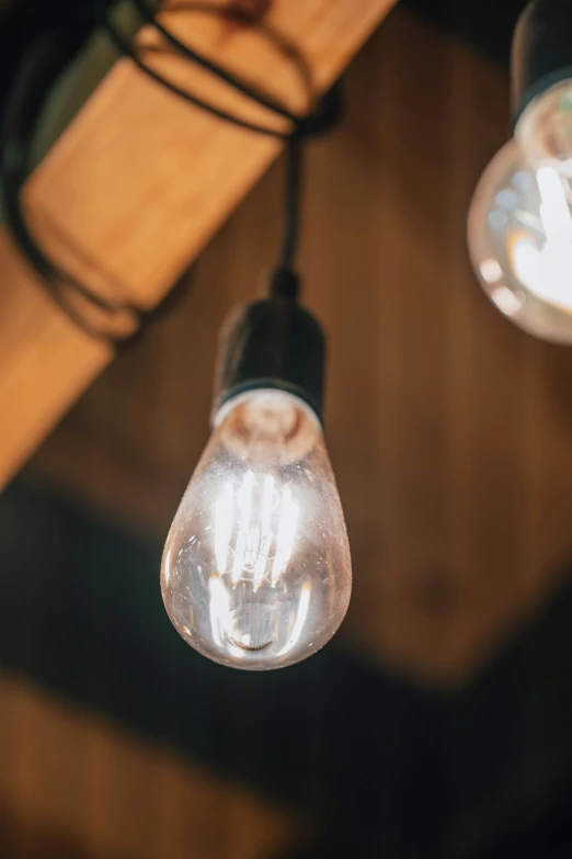 a close up of three bulbs lighting up