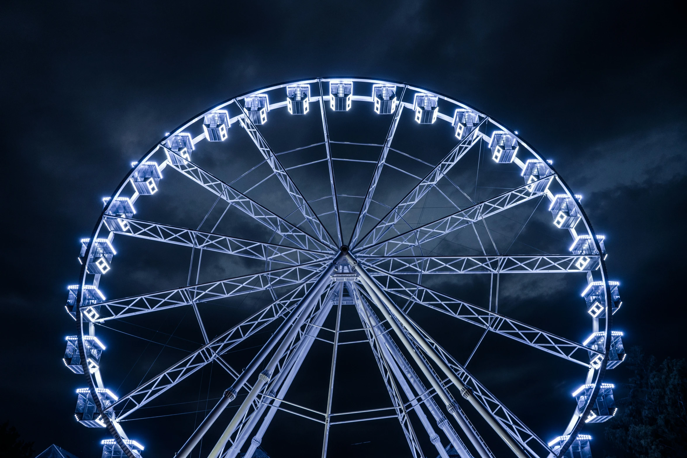 the ferris wheel has many lights on it