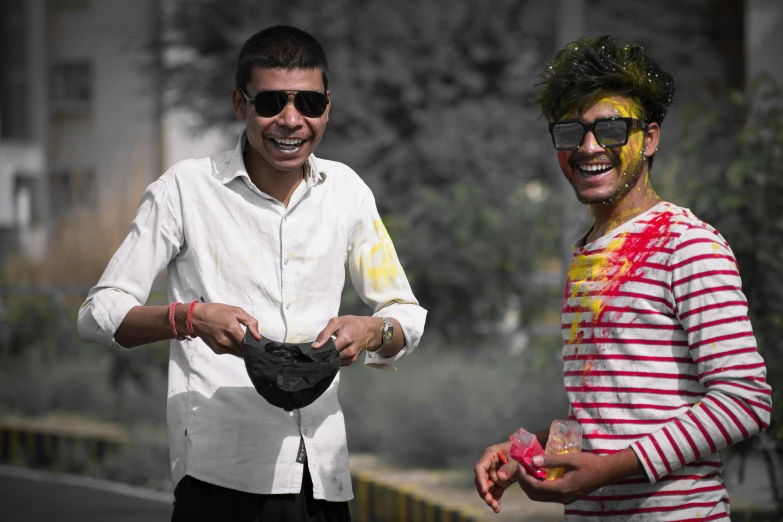 a man is dressed in his crazy colors and is helping someone