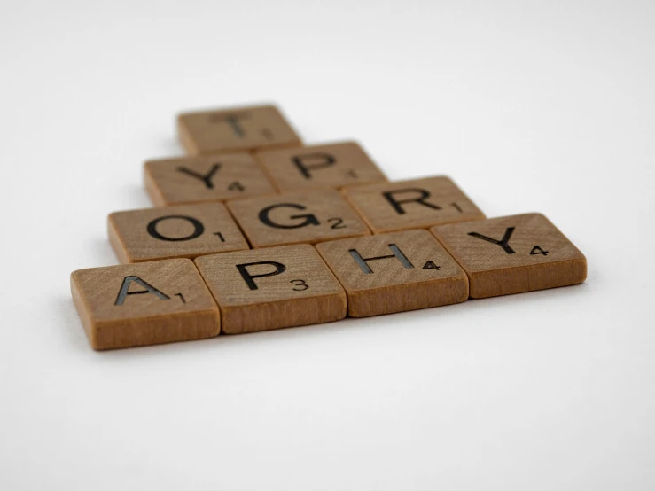 there are two pieces of wood that say yogi's alphabet