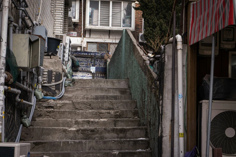 some dirty steps down to some buildings