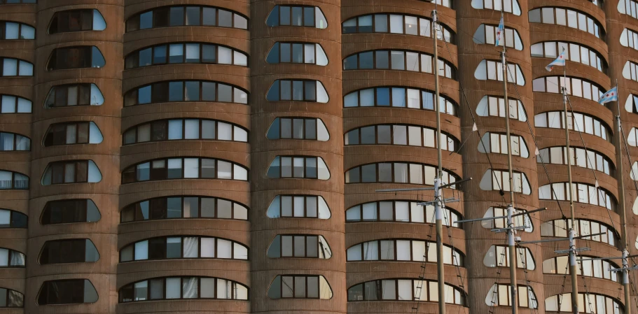 a large building has lots of windows and lights