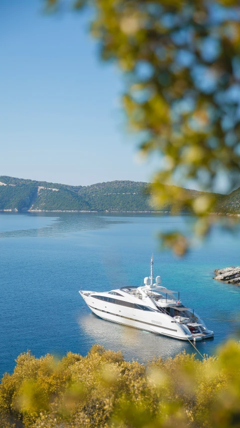 a large white boat out in the middle of a body of water