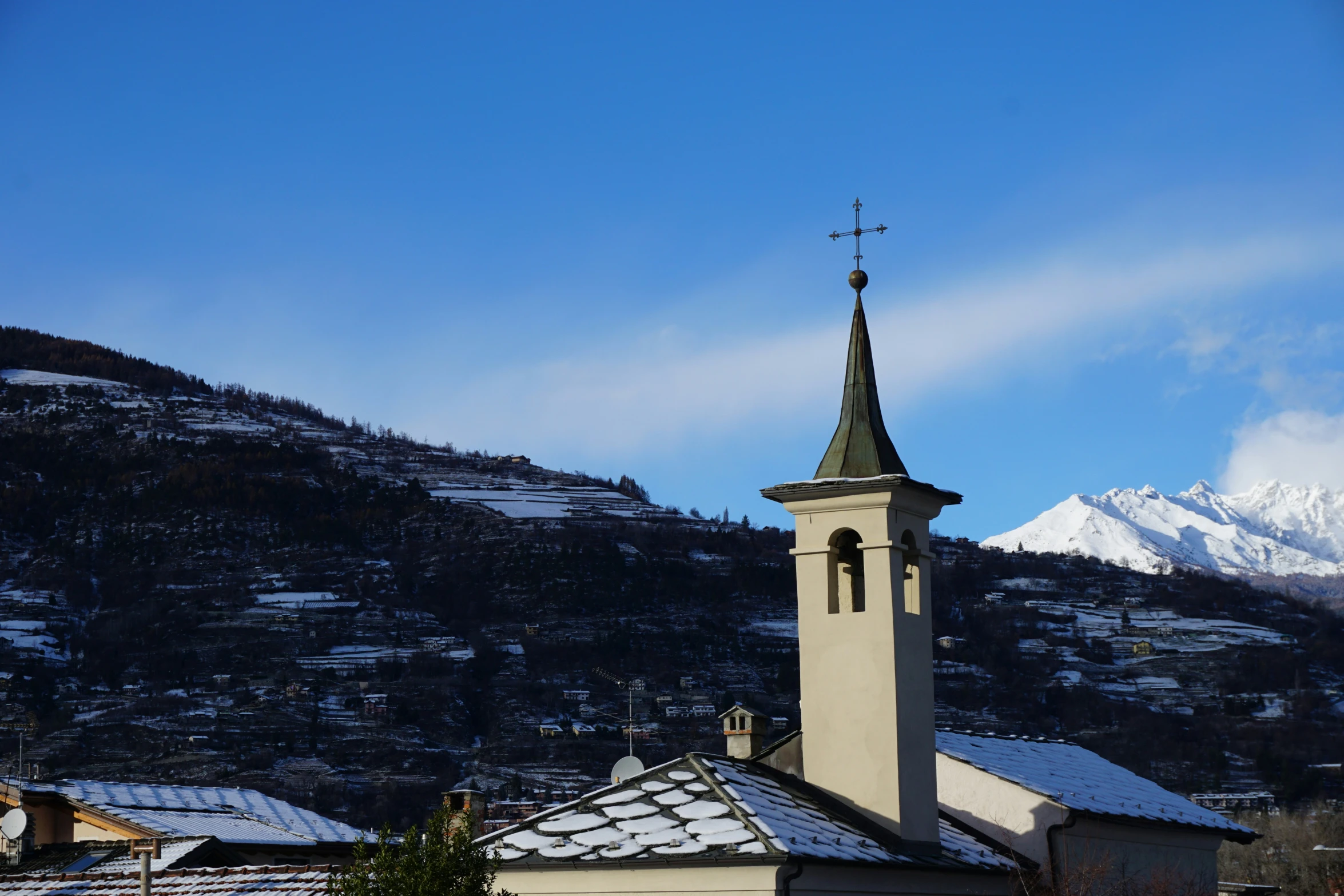 a church with two towers and a steeple on top