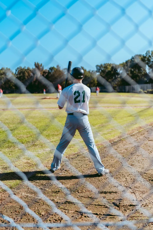 a baseball player is up to bat in a game