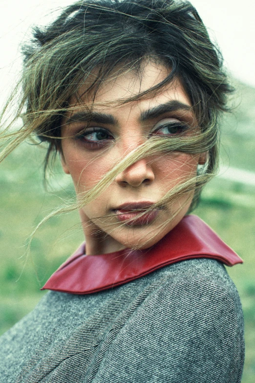 a close up of a person with long hair