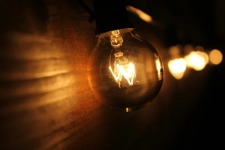 a lit up bulb with a light bulb attached to it