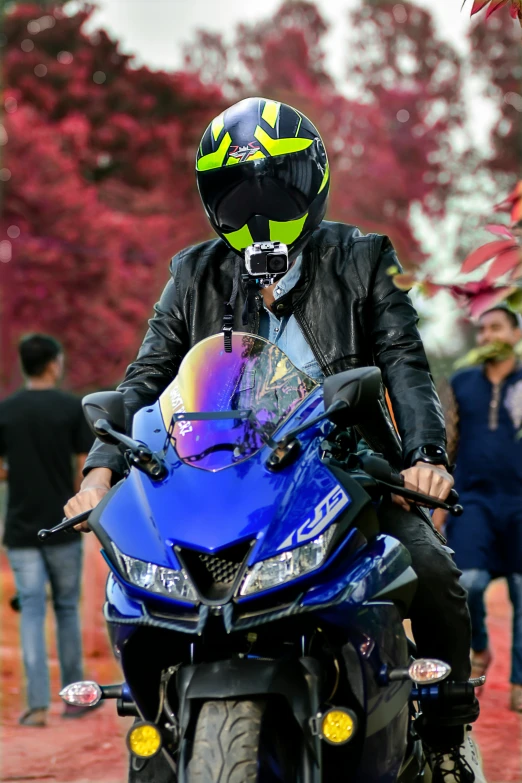 a person riding a motorcycle on a street