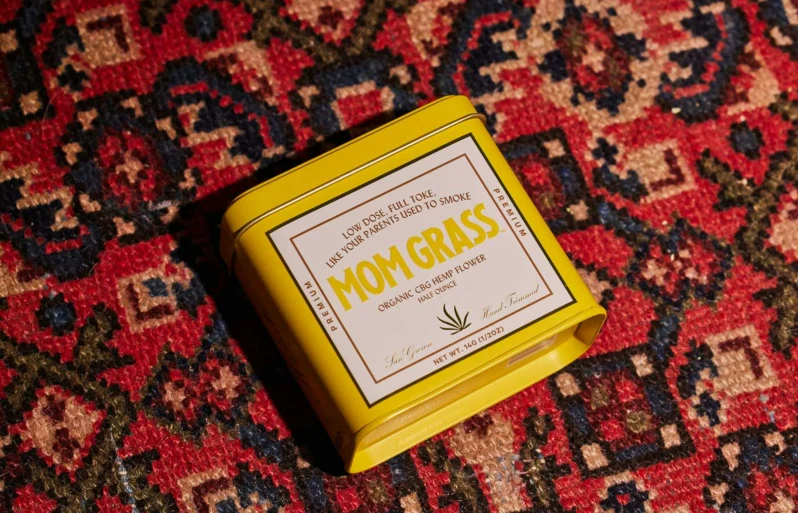 a piece of yellow tea is sitting on a rug