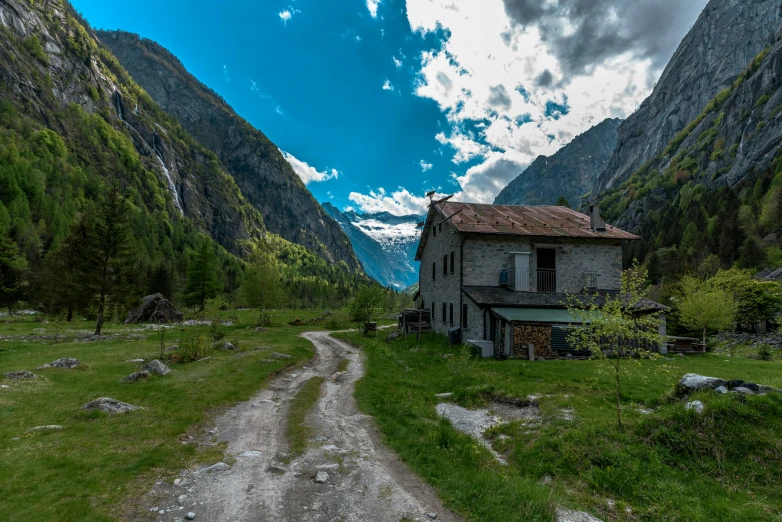 there is an abandoned house near a mountain