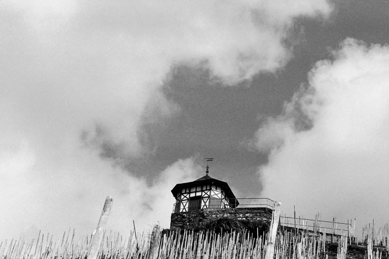 the sky with clouds and smoke pouring out of the chimneys