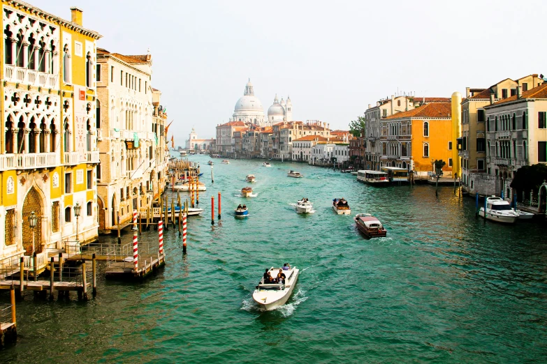 a canal on a sunny day in venice