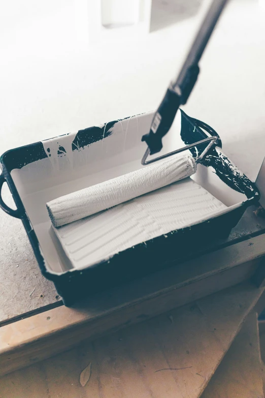 a knife that is in a tray on a table