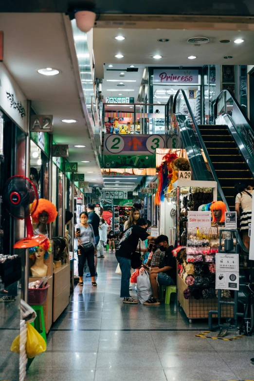 a shopping center with two groups of people