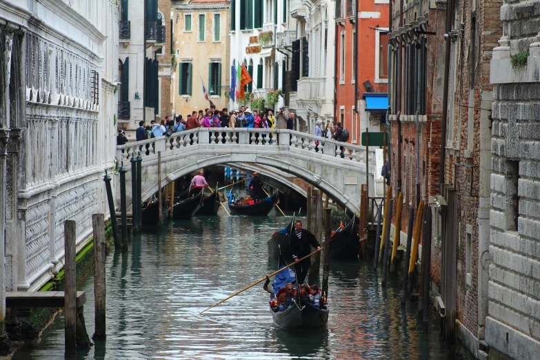 gondola moving along the water on a waterway in italy