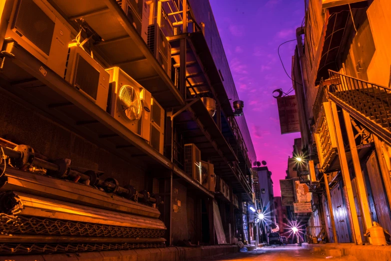 a street is empty at night, with no cars parked