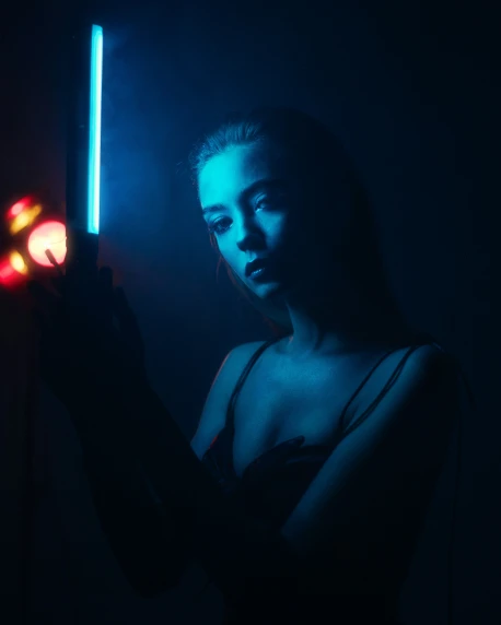 a person with a light saber in their hand