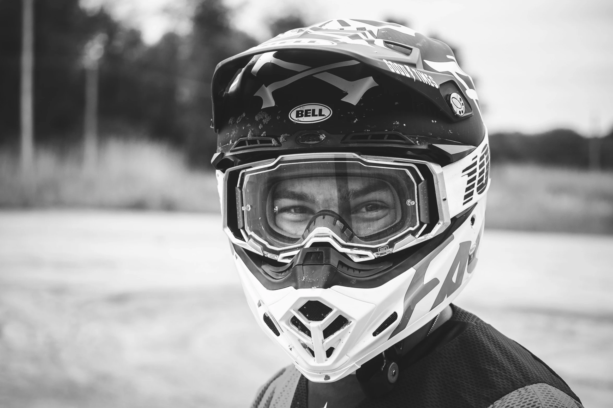 man with helmet on staring towards camera