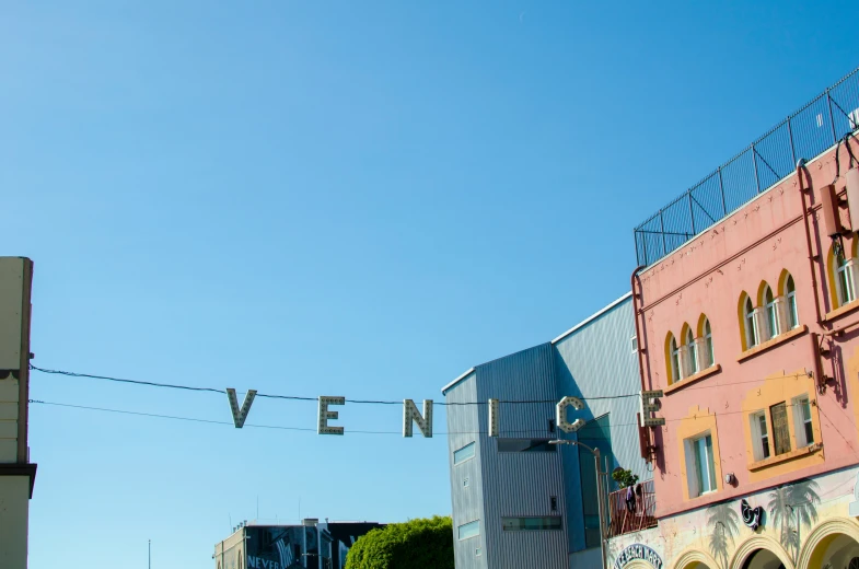 a banner that says ever hangs on the side of a building