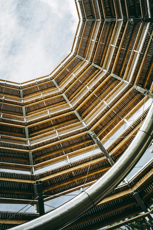 the inside of a roof that is made from wood