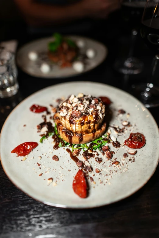 some food on a white plate on a table