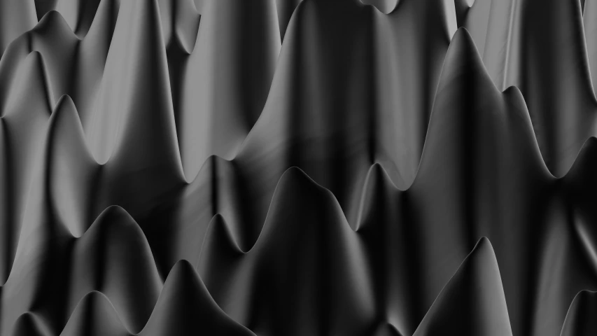 black and white pograph of a series of wavy, layered hills