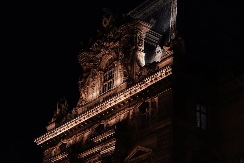 the old building is bathed in dark lighting