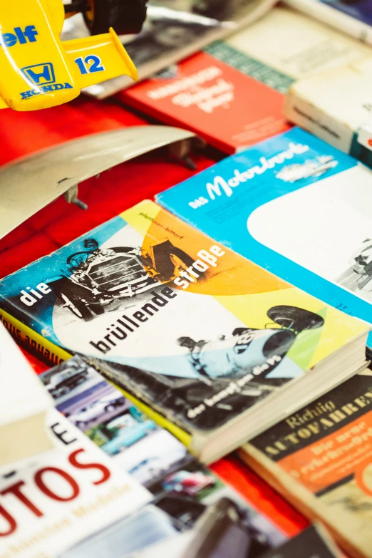 a pile of different kinds of flyers on display