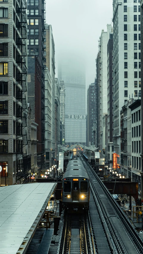 the city train is waiting for the commuter to arrive