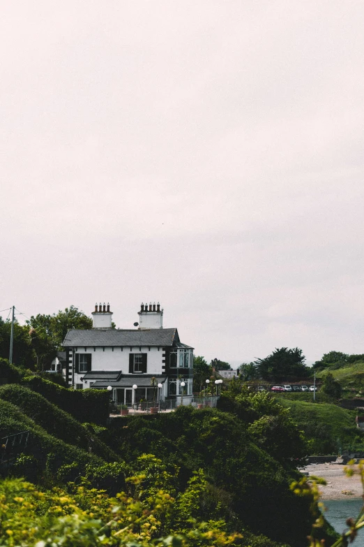 the building on the hill is white and very tall