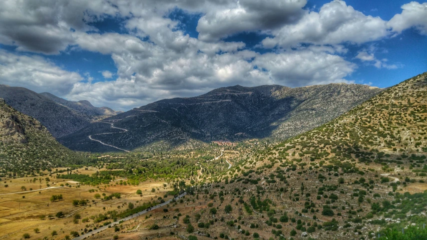 a view from a hill on the mountain top