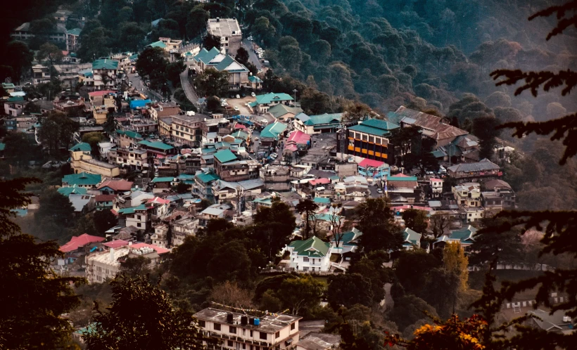 many houses are nestled up on a hillside