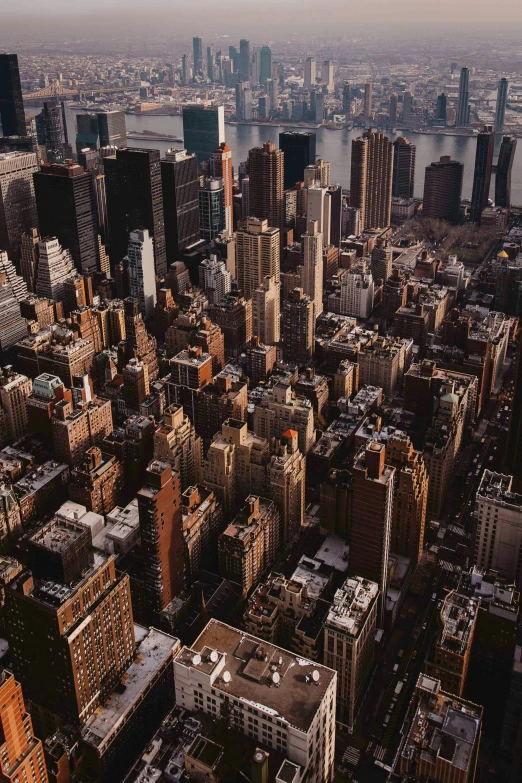 an aerial view of the city with tall buildings