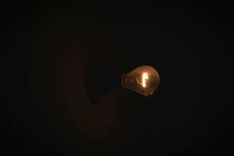 an image of a light bulb that is in the dark