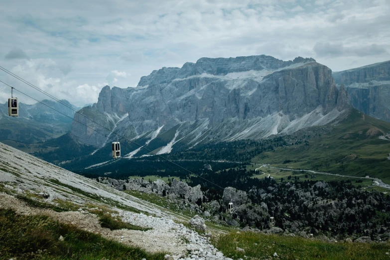 a cable car going down a mountain side