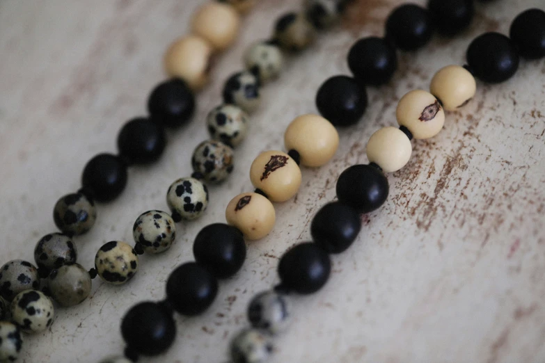 the beads are lined up together on the table