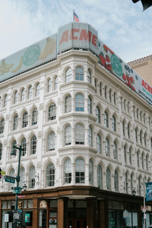 the old white building in this town is painted for christmas