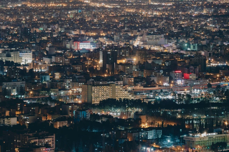 an aerial view of a city at night