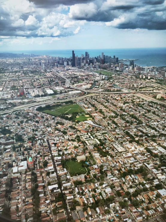 an aerial view of a city skyline and a lake