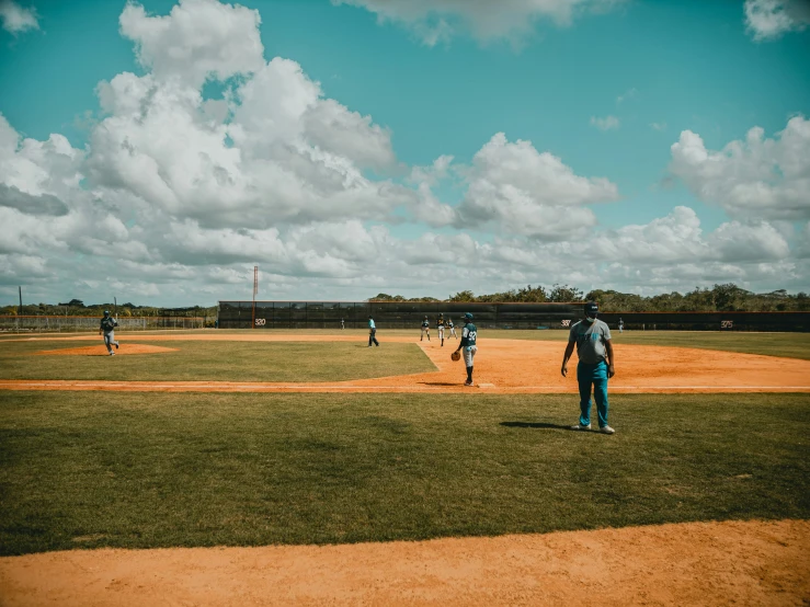 the baseball player is standing on home plate ready to pitch