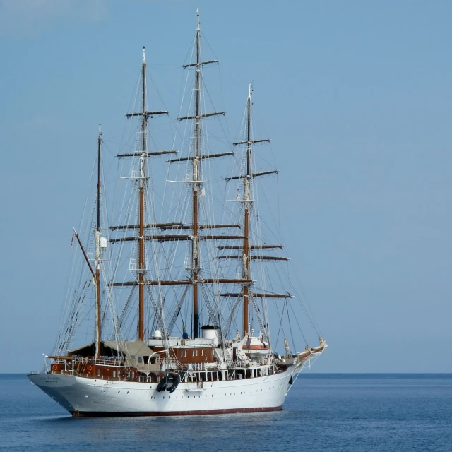 a large boat floating on the ocean water