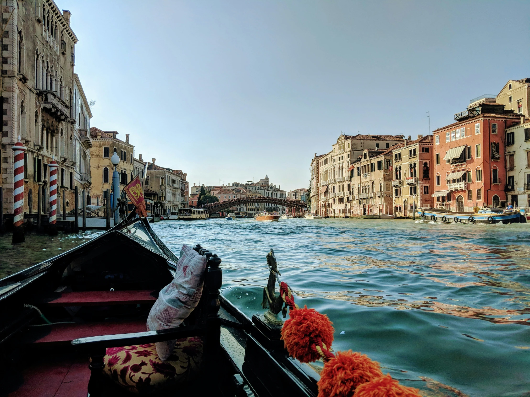 the water is blue and still full of boats