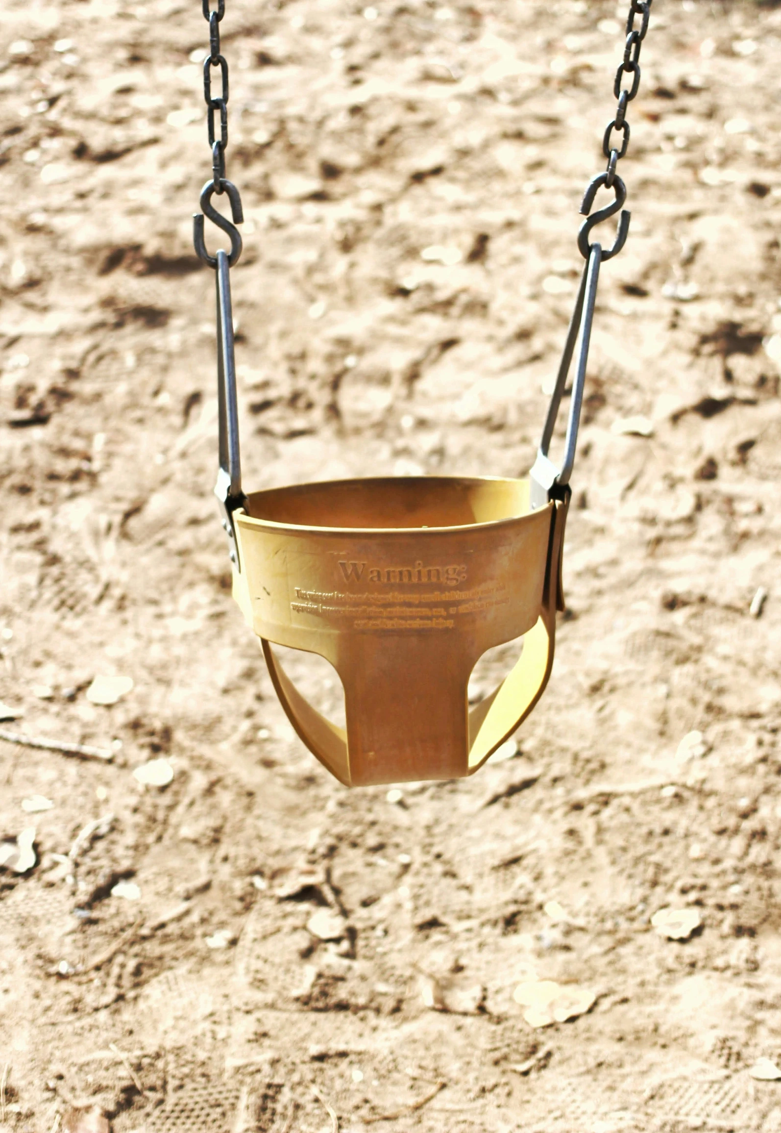 two children swings and a metal handle