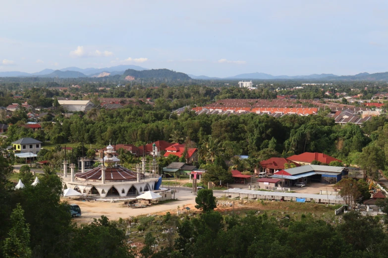 an overview of a city with tall buildings and lots of trees