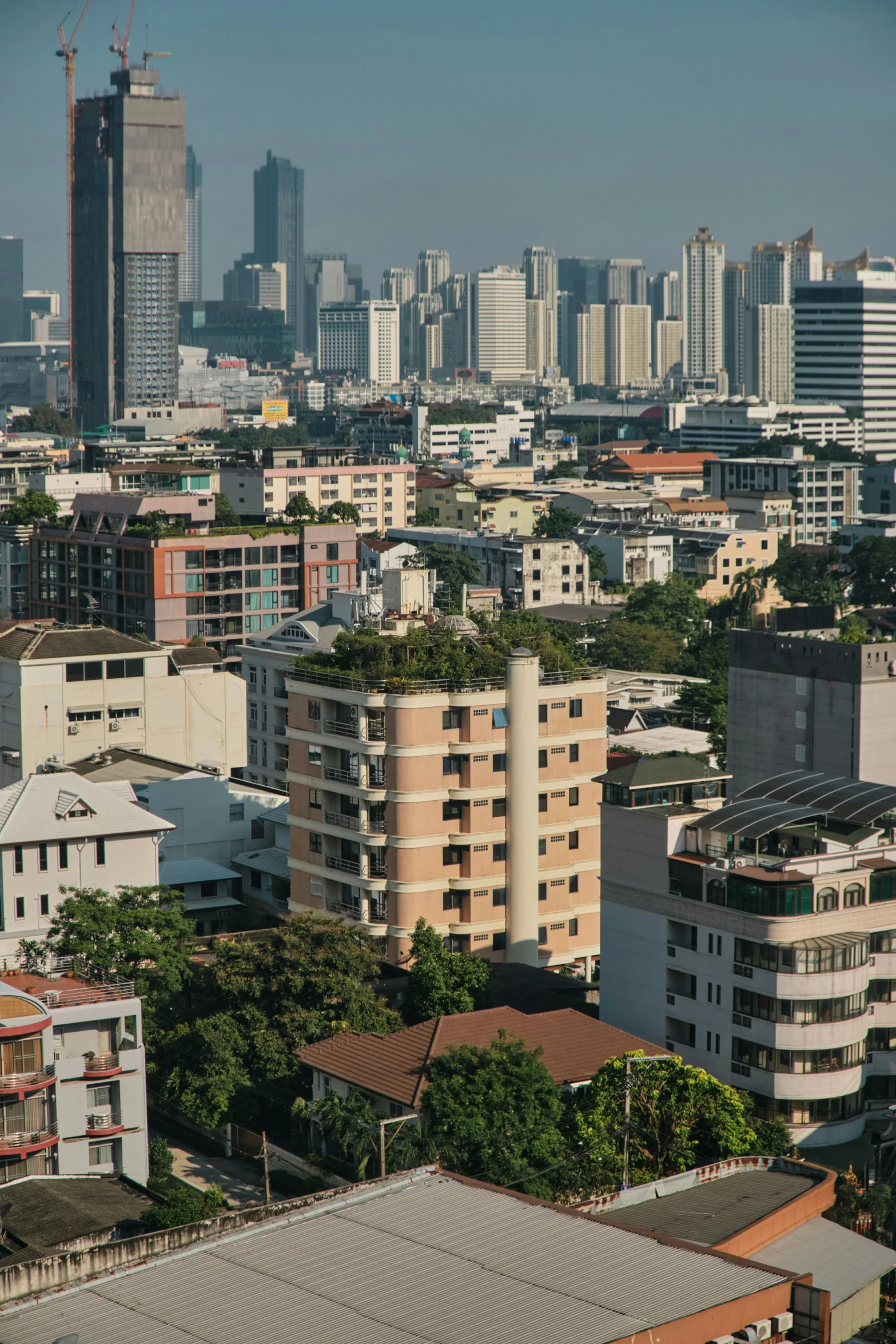 a bird view of buildings and a cityscape in the background