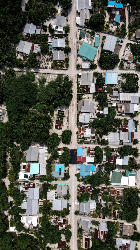 an aerial view of houses in an arid country side