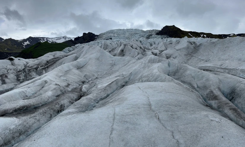 an image of a mountain that looks like it's melting snow