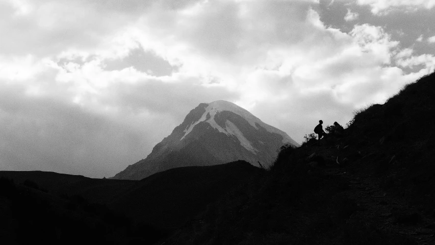 a couple of people ride on top of a horse