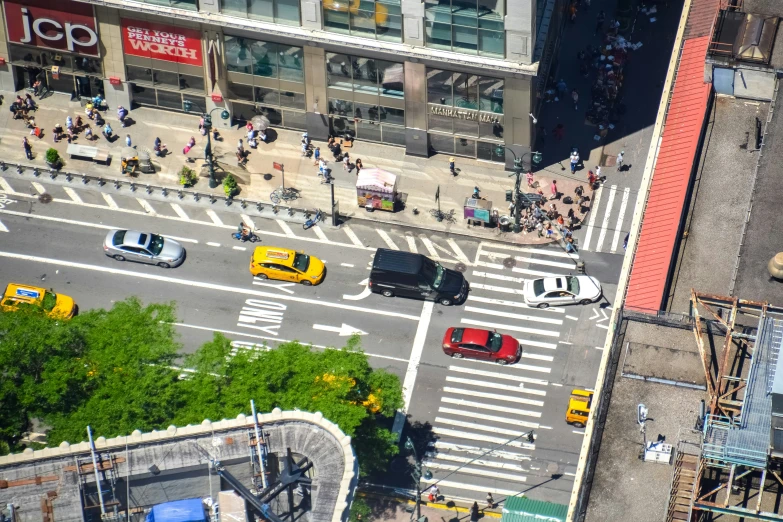 an aerial view of traffic on a city street